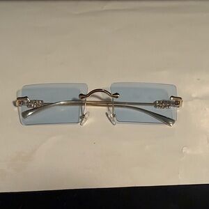 Elegant Silver and Blue Rimless Glasses